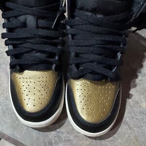 Nike Black and Gold Logo Insole Sneakers